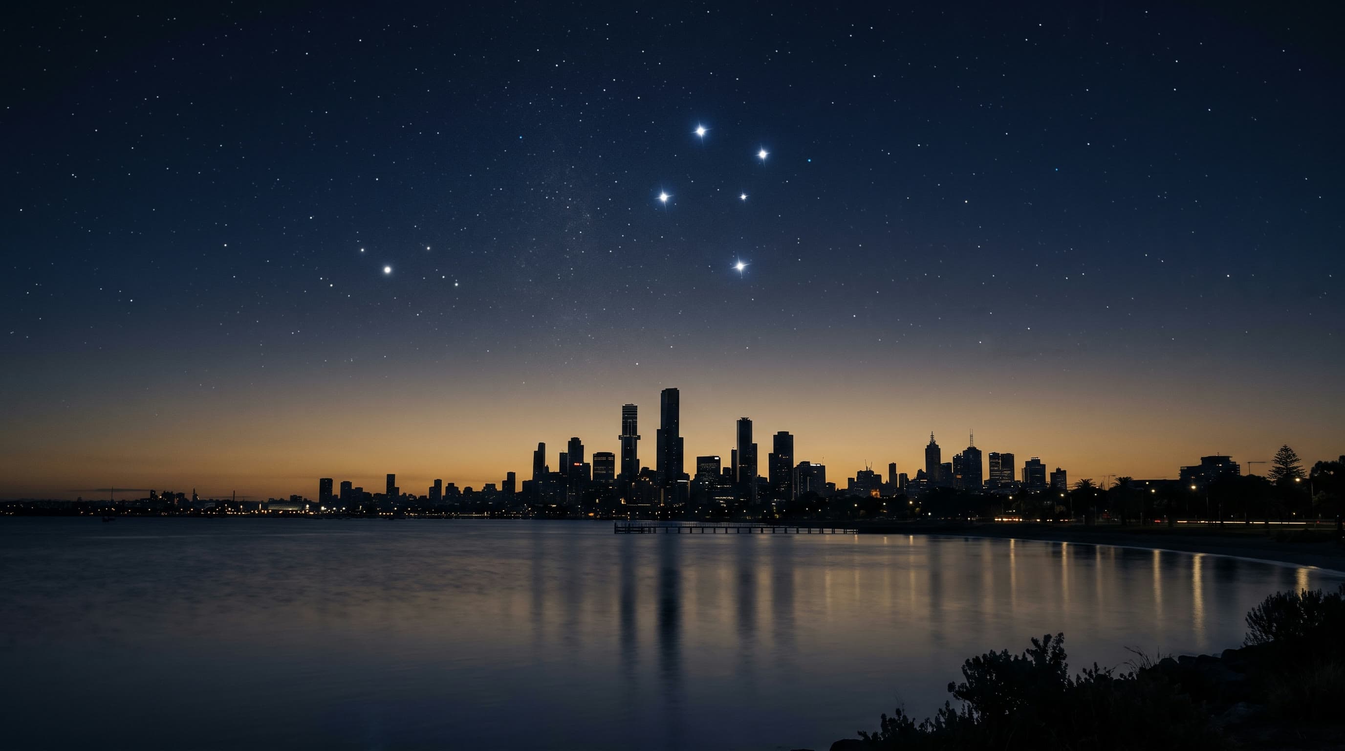 The Southern Cross constellation above a silhouetted Australian skyline